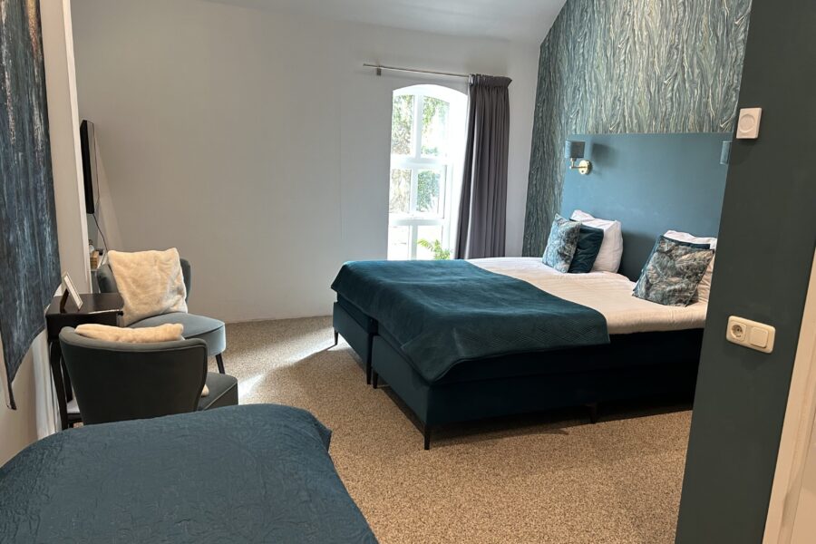 Groepsaccommodatie Mariafarm — kamer in groentinten